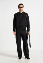 boris-relaxed-fit-tailored-button-cuff-trousers-black