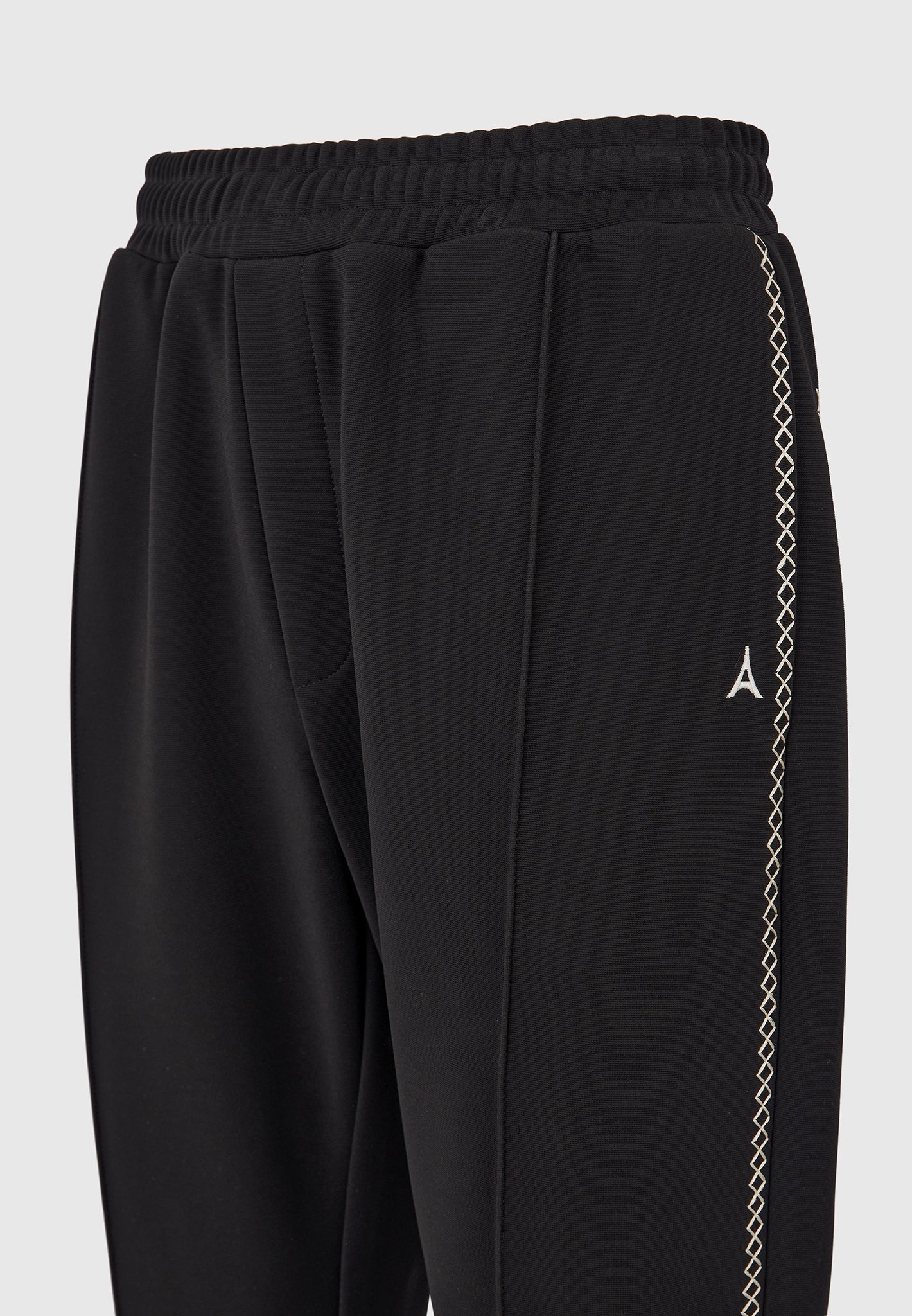 gael-contrast-whipstitch-relaxed-track-pants-black
