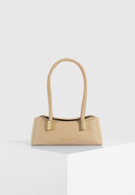 Annelise - Pebbled Leather Baguette Bag - Beige