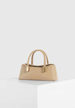 Annelise - Pebbled Leather Baguette Bag - Beige