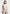 eternelle-sheer-long-sleeve-bodysuit-beige