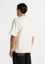 TS001 - Unisex Signature Relaxed Fit Cotton T-Shirt - Cream