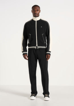 tristan-contrast-whipstitch-raglan-track-jacket-black