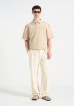 simon-boxy-textured-polo-shirt-beige