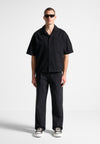 arnault-pleated-jeans-washed-black
