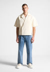 arnault-pleated-jeans-washed-blue