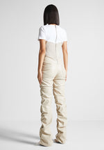 tacked-vegan-leather-t-shirt-jumpsuit-beige