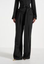 Aurore - Mock Neck Ring Belt Pleated Leg Jumpsuit - Black