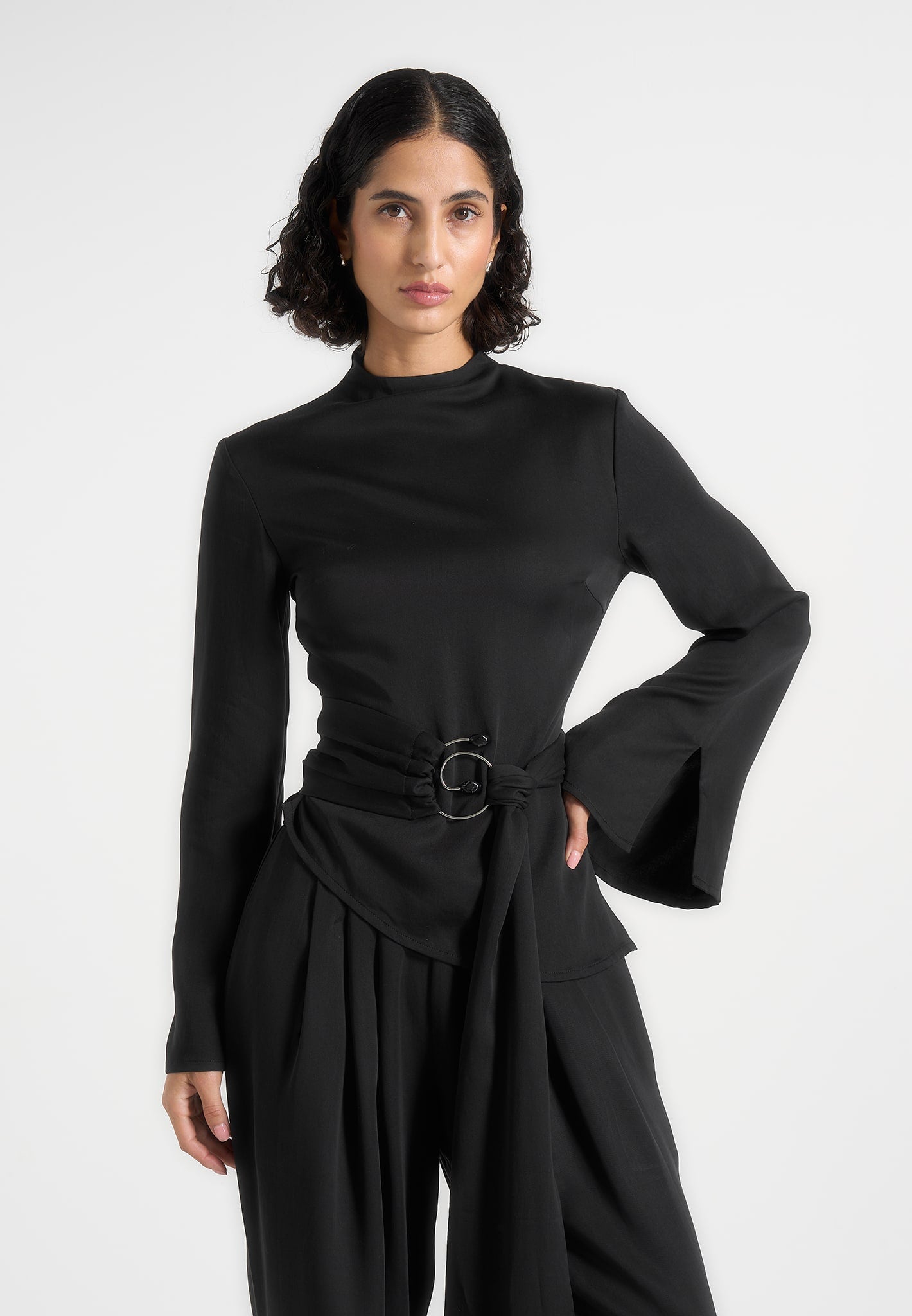 Aurore - Mock Neck Ring Belt Pleated Leg Jumpsuit - Black