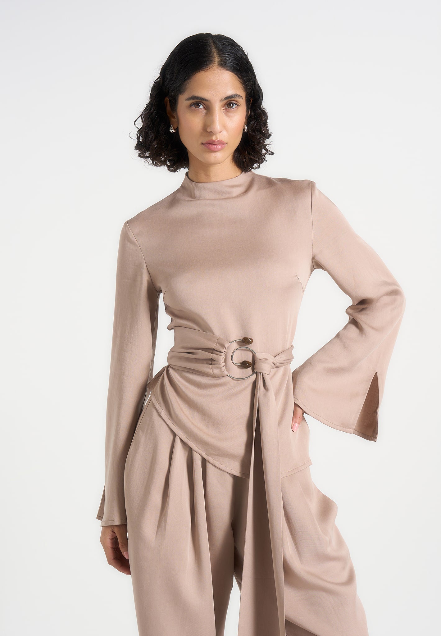 Aurore - Mock Neck Ring Belt Pleated Leg Jumpsuit - Beige