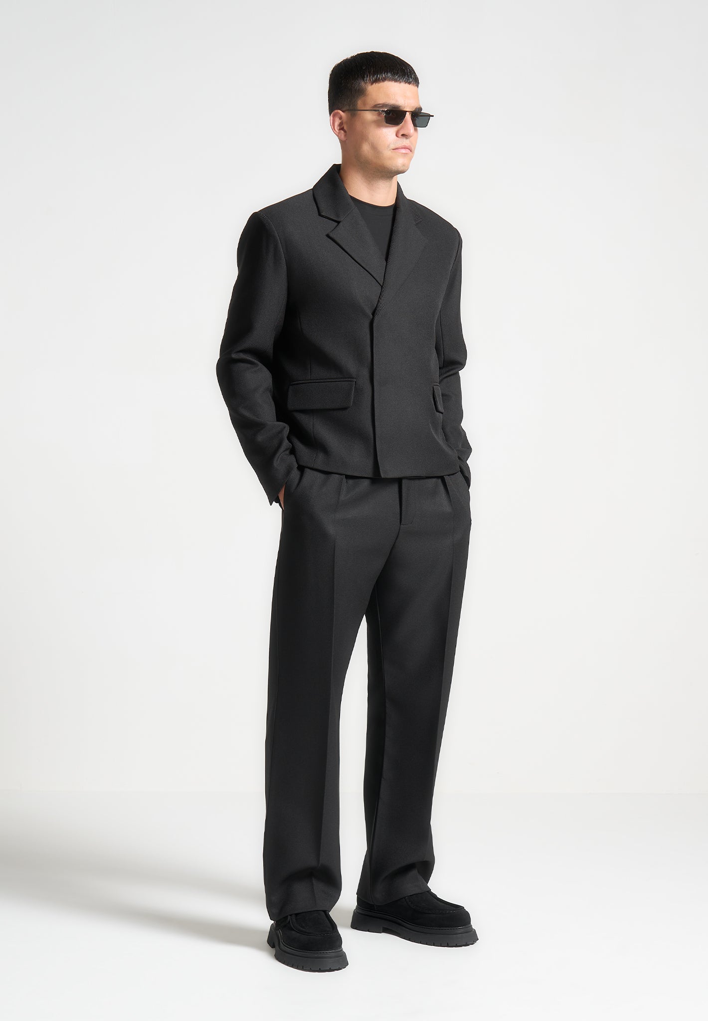 relaxed-fit-textured-pleated-tailored-trousers-black