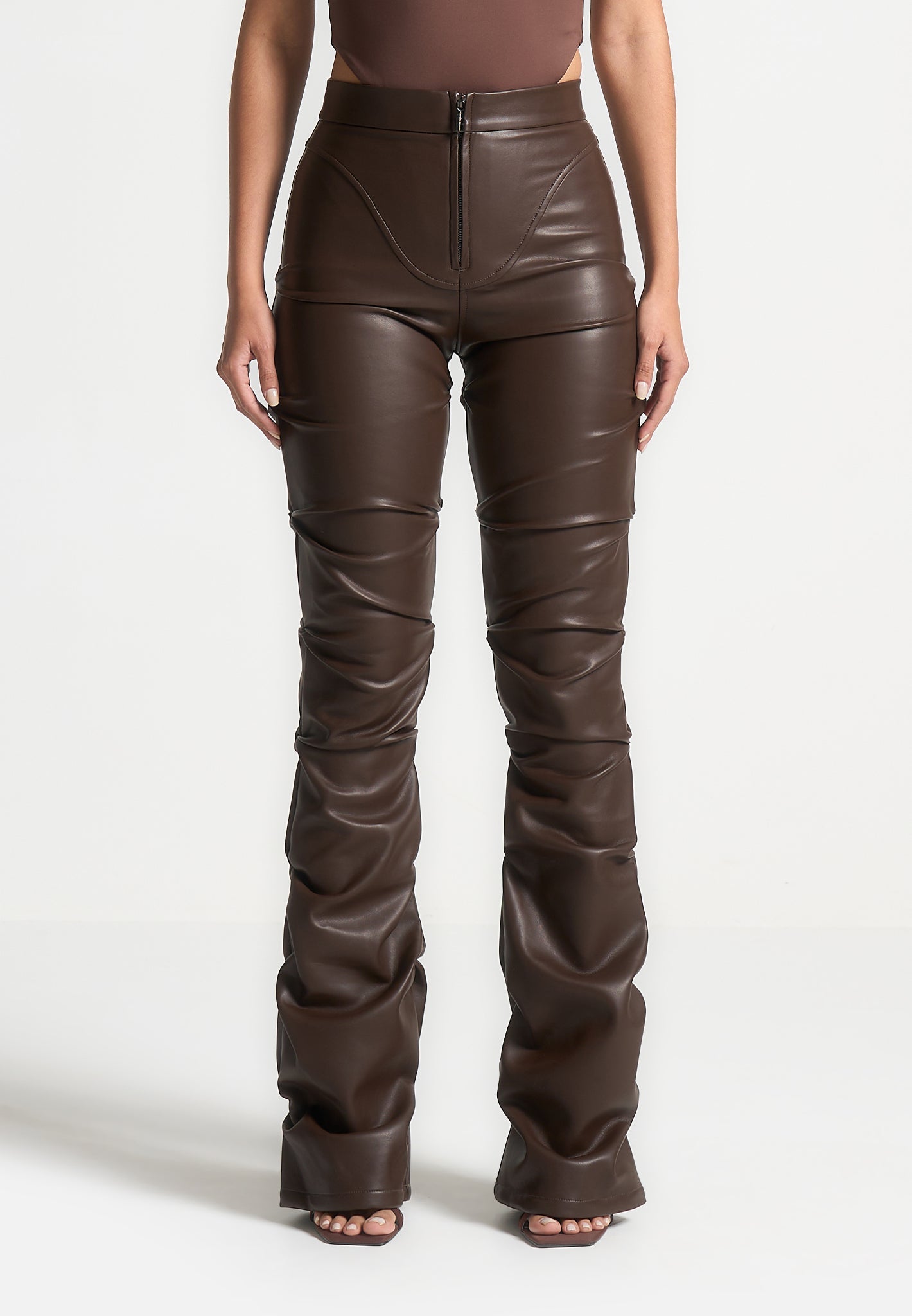 tacked-vegan-leather-flared-trousers-brown