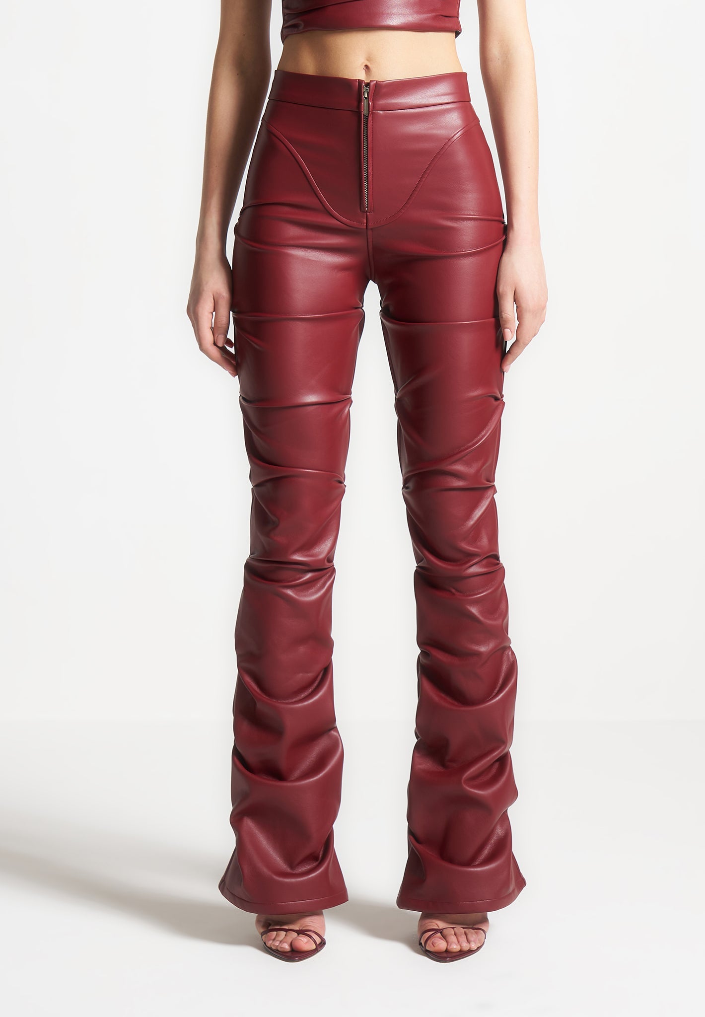 tacked-vegan-leather-flared-trousers-wine-red