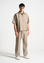 textured-belted-tailored-trousers-beige-1